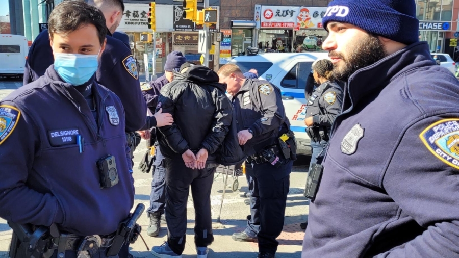 Suspect Arrested After Attack on Falun Gong Booth