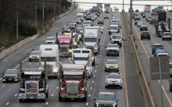 Vehicles in Truck-Led Convoy Ride Through Washington, DC