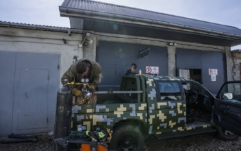 Ukrainian Welders Turn Donated Vehicles Into Army Transport