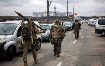 Ukrainian Forces Retake Control of Key Town Outside Kyiv, Mayor Claims