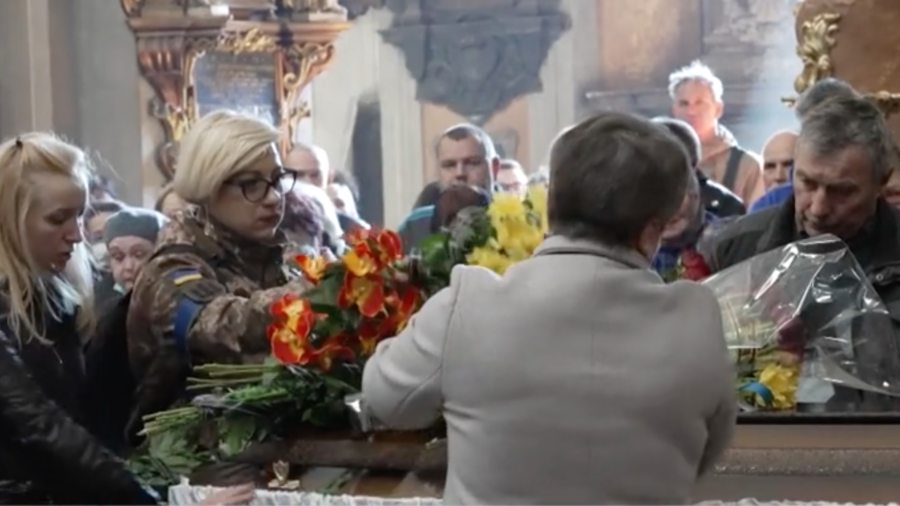 Ukrainians Attend Funeral for Fallen Soldier