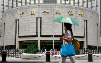 China Cuts Key Rates as Weak Batch of July Data Darkens Economic Outlook
