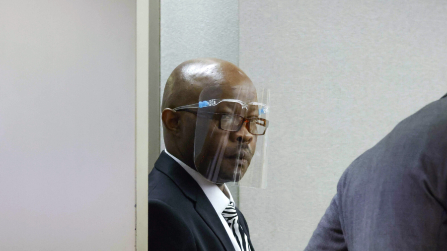 Retrial for Man Charged With Killing 18