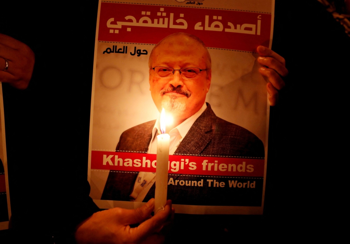 A demonstrator holds a poster with a picture of Saudi journalist Jamal Khashoggi outside the Saudi Arabia consulate in Istanbul, Turkey, on Oct. 25, 2018. (Osman Orsal/Reuters)
