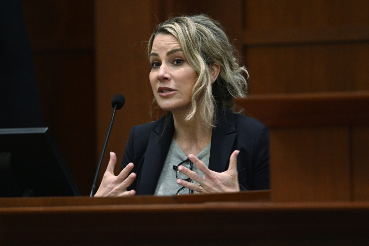 Clinical and forensic psychologist Dr. Shannon Curry, testifies in the courtroom at the Fairfax County Circuit Court in Fairfax, Va., on April 26, 2022. (Brendan Smialowski/Pool Photo via AP)