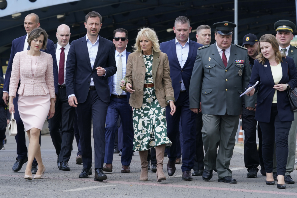 First Lady Jill Biden speaks with Slovakia's Prime Minister Eduard Heger as she walks from Vysne Nemecke, Slovakia, crossing the border with Ukraine (red line) during a visit, on May 8, 2022. (Susan Walsh/AP Photo, Pool)