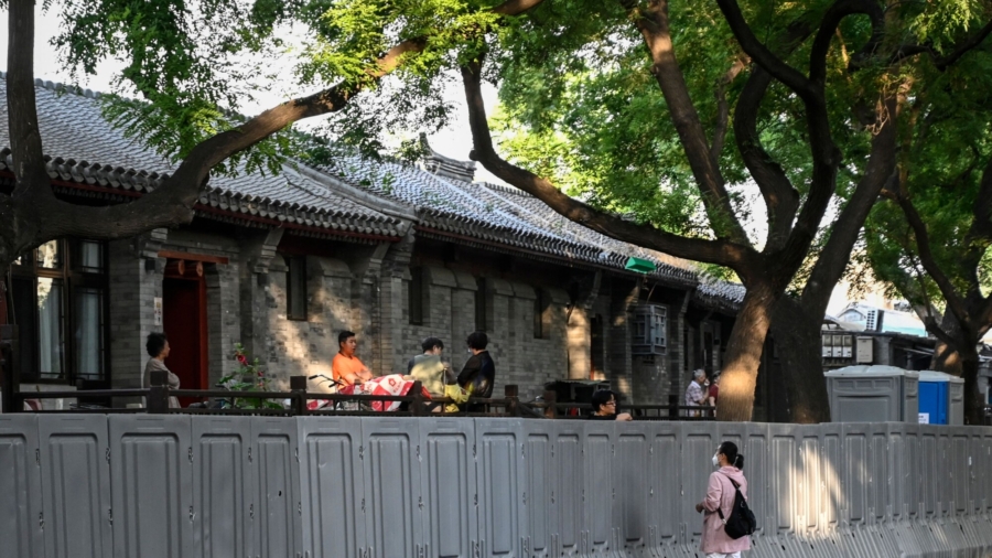Beijing Tightens Virus Rules, Medical Delays Persist