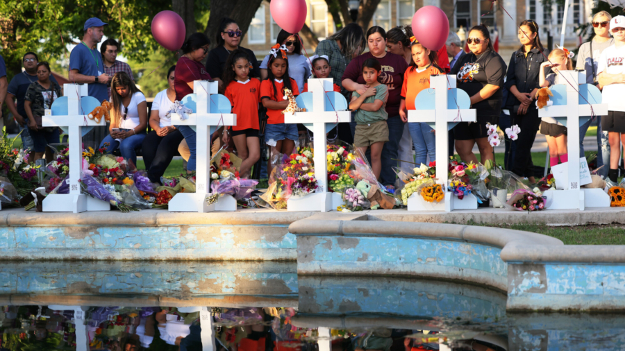 Community Mourns Victims at Town Square