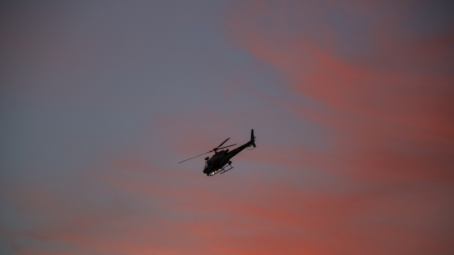 Helicopter Rescues Man Stuck on Cliff Wall