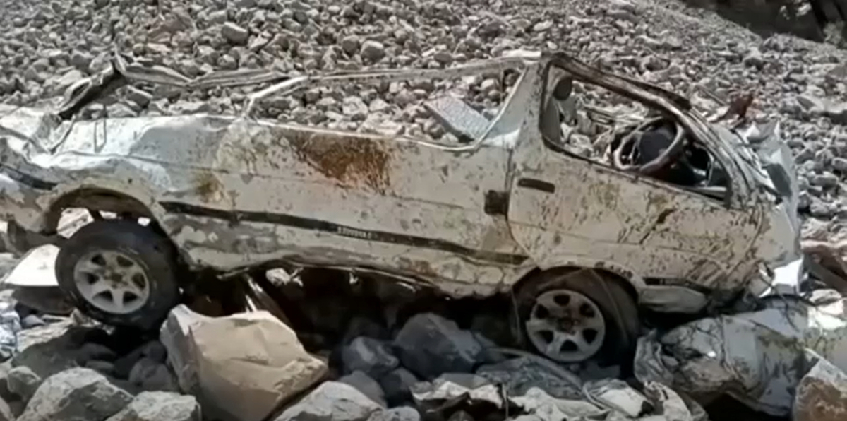 The wreckage of a minibus after it veered off a narrow mountain road and plummeted into a ravine, in Qilla Saifullah, a district in Pakistan's southwest Baluchistan province, on June 8, 2022, in a still from video. (AP/Screenshot via NTD)