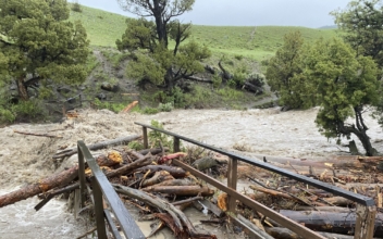 Yellowstone Floods Wipe Out Roads, Bridges, Strand Visitors