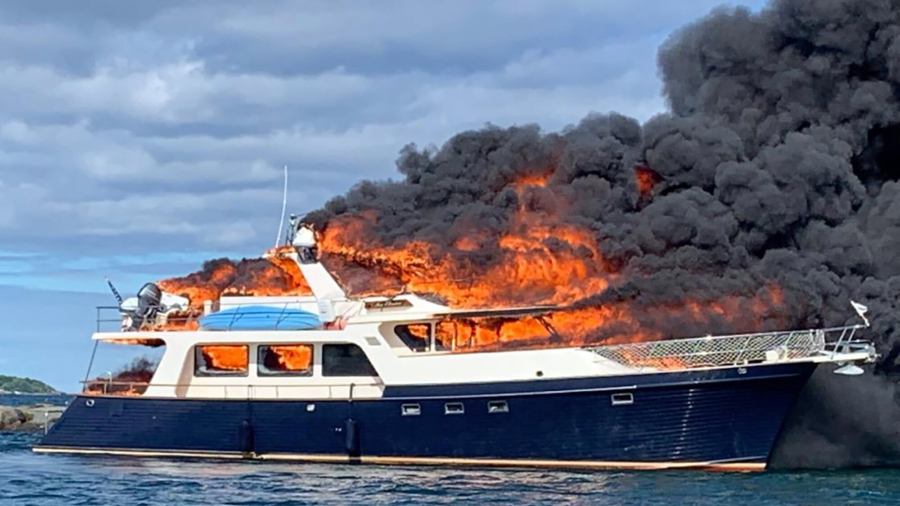 3 People, 2 Dogs Jump Overboard as Yacht Burns and Sinks