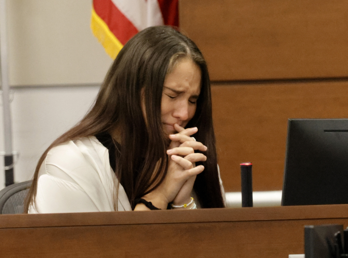 State witness Danielle Gilbert, who was a student at Marjory Stoneman Douglas High School, cries during direct examination in the penalty phase trial of Nikolas Cruz at the Broward County Courthouse in Fort Lauderdale, Fla., on July 18, 2022. (Carline Jean/Pool/AFP via Getty Images)
