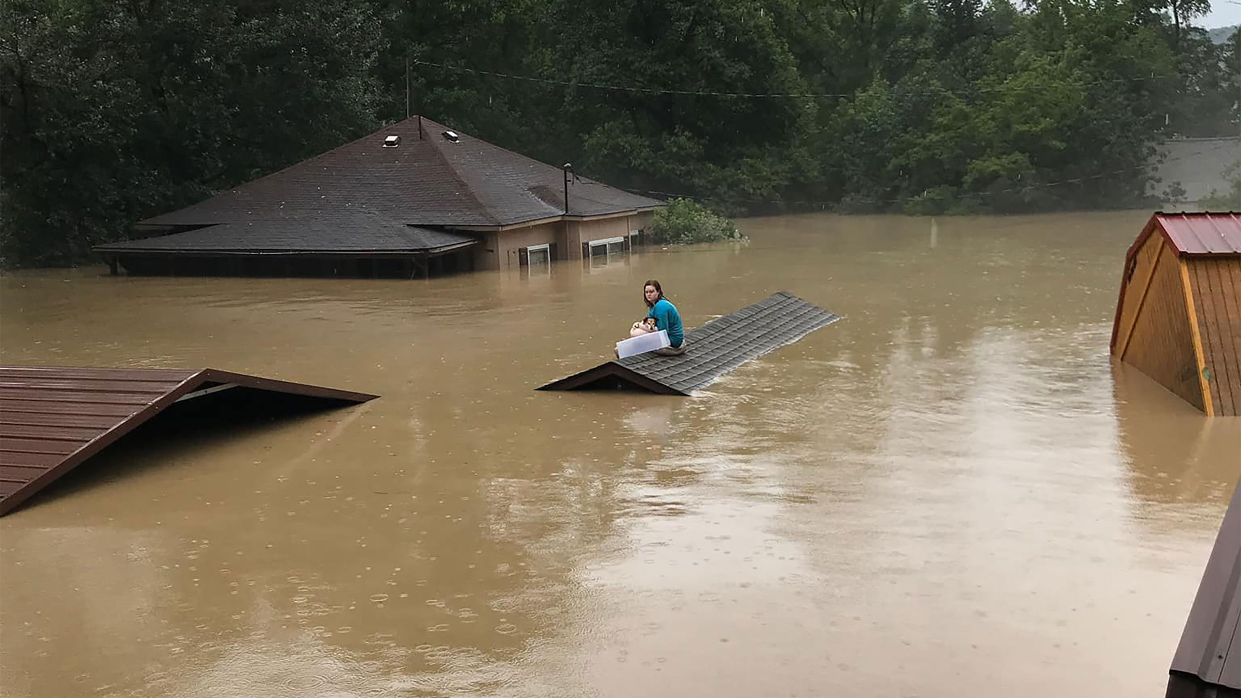 17-Year-Old Swims Out of Flooded Home With Dog and Waits for Hours on Roof to Be Rescued