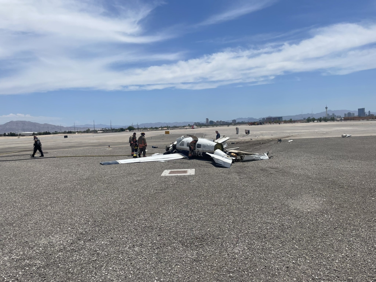 One of two planes involved in a mid-air collision lies on the ground at the North Las Vegas Airport, Nev., on July 17, 2022. (North Las Vegas Fire Department)