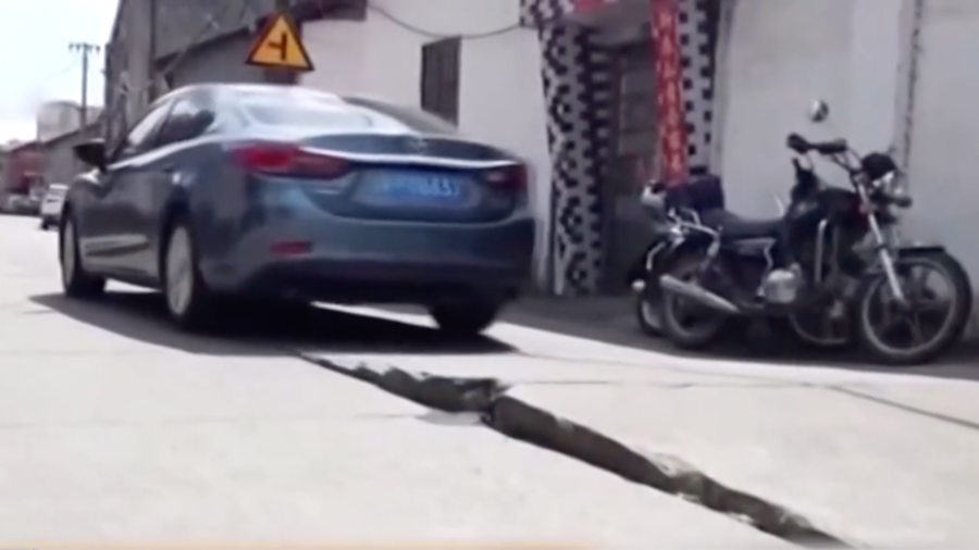 Heat Waves in Chinese Cities Buckle Roads, Melt Roofs