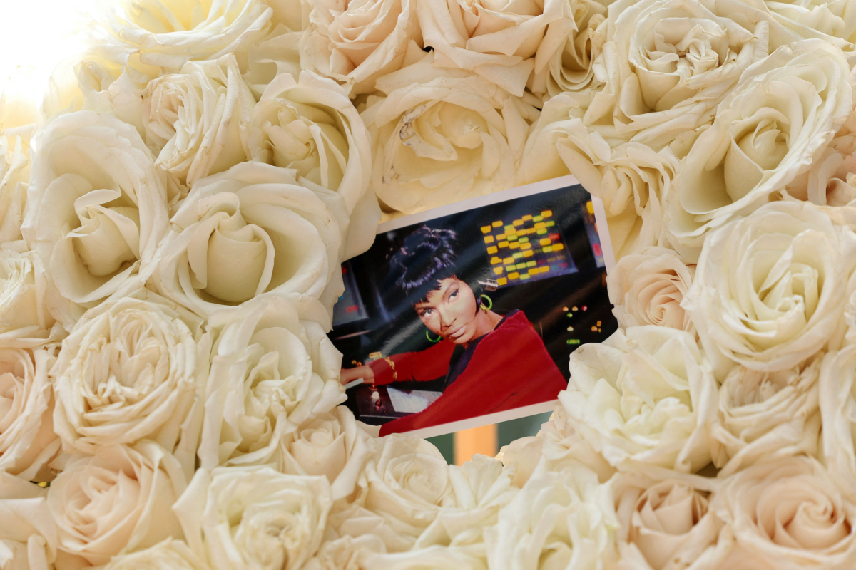 A photograph of late actress Nichelle Nichols is pictured in a rose wreath placed on her star on the Hollywood Walk of Fame in Los Angeles on Aug. 1, 2022. (Mario Anzuoni/Reuters)