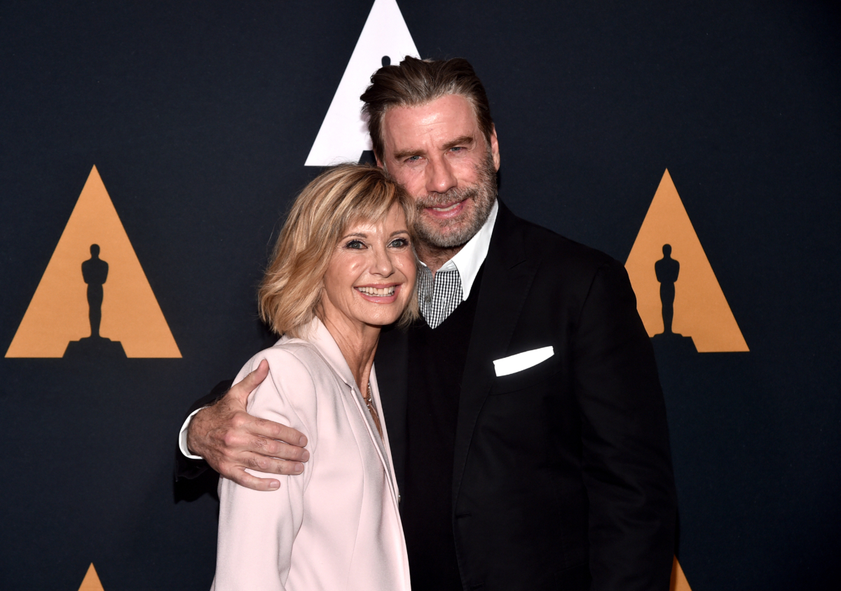 Olivia Newton-John (L) and John Travolta attend the "Grease" 40th-anniversary screening at Samuel Goldwyn Theater in Beverly Hills, Calif., on Aug. 15, 2018. (Alberto E. Rodriguez/Getty Images)