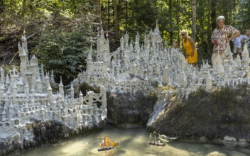 Swiss Artist Sculpts Sprawling Model Castle on River Bank