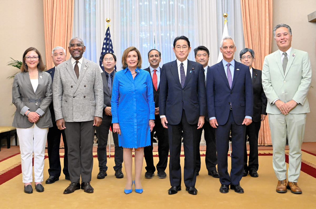 Japan's Prime Minister Fumio Kishida (front 3rd R), U.S. House Speaker Nancy Pelosi (front, 3rd L), U.S. Ambassador to Japan Rahm Emanuel (front, 2nd R), and members of U.S. House of Representatives pose for a photo session at the prime minister's official residence in Tokyo on Aug. 5, 2022. (Japan Pool/Jiji Press/AFP via Getty Images)