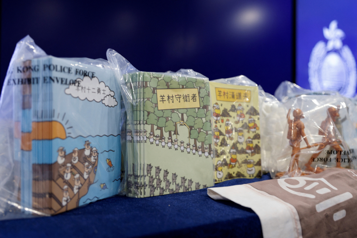 Children's books are pictured during a news conference after five people were arrested on suspicion of conspiring to publish "seditious material" with the intent of inciting public hatred towards the authorities among children in Hong Kong on July 22, 2021. (Tyrone Siu/Reuters)