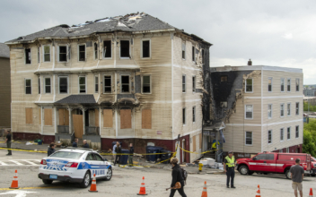 Woman Charged With Setting Fire at Apartment That Killed 4