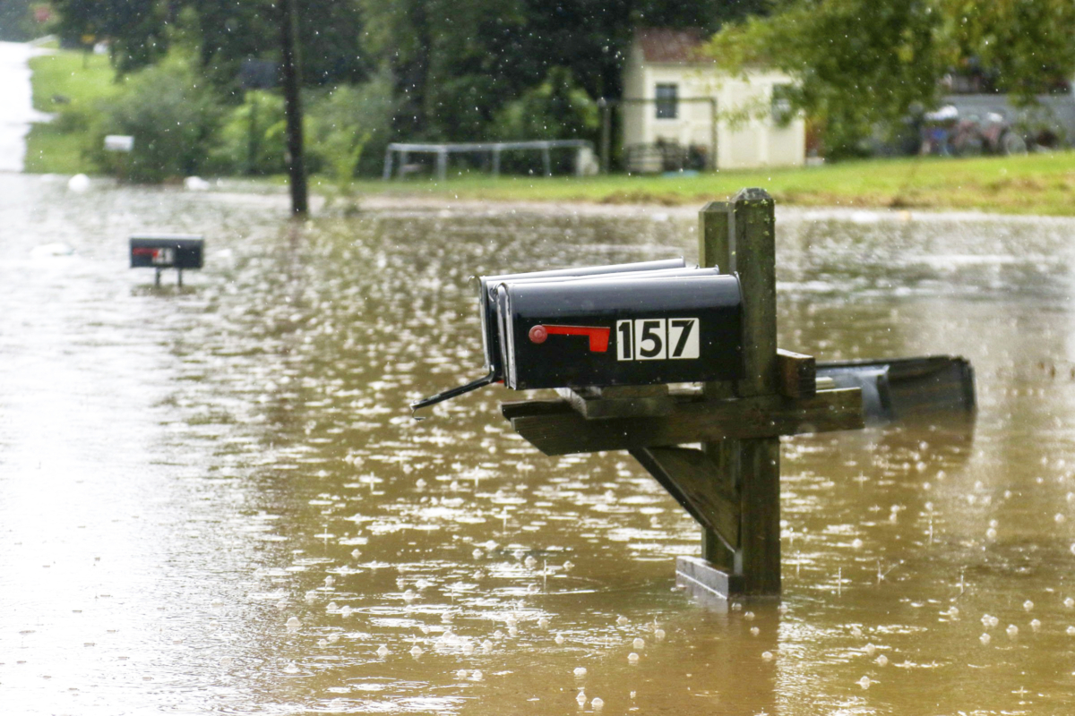 Bittings Avenue is partially underwater in Summerville, Ga., on Sept. 4, 2022. (Olivia Ross/Chattanooga Times Free Press via AP)