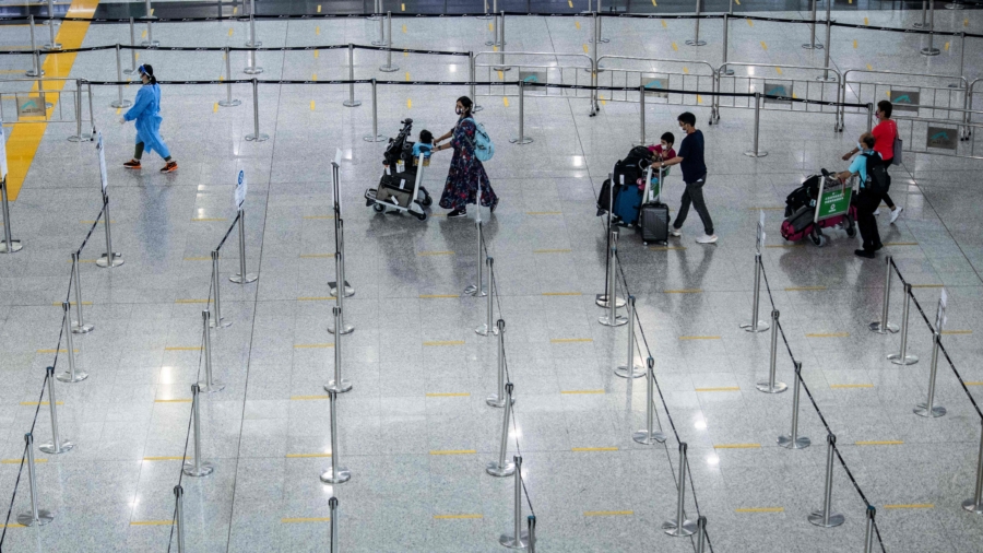 Hong Kong Curbs Restrictions for International Travelers