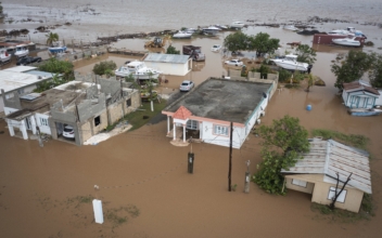 Hurricane Fiona Dumps More Rain on Puerto Rico; Troops Rescue Hundreds