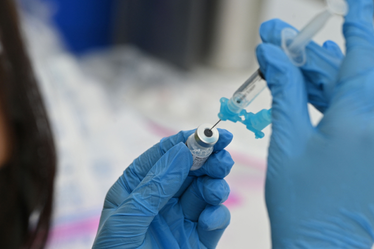 syringe with Pfizer Covid-19 vaccine