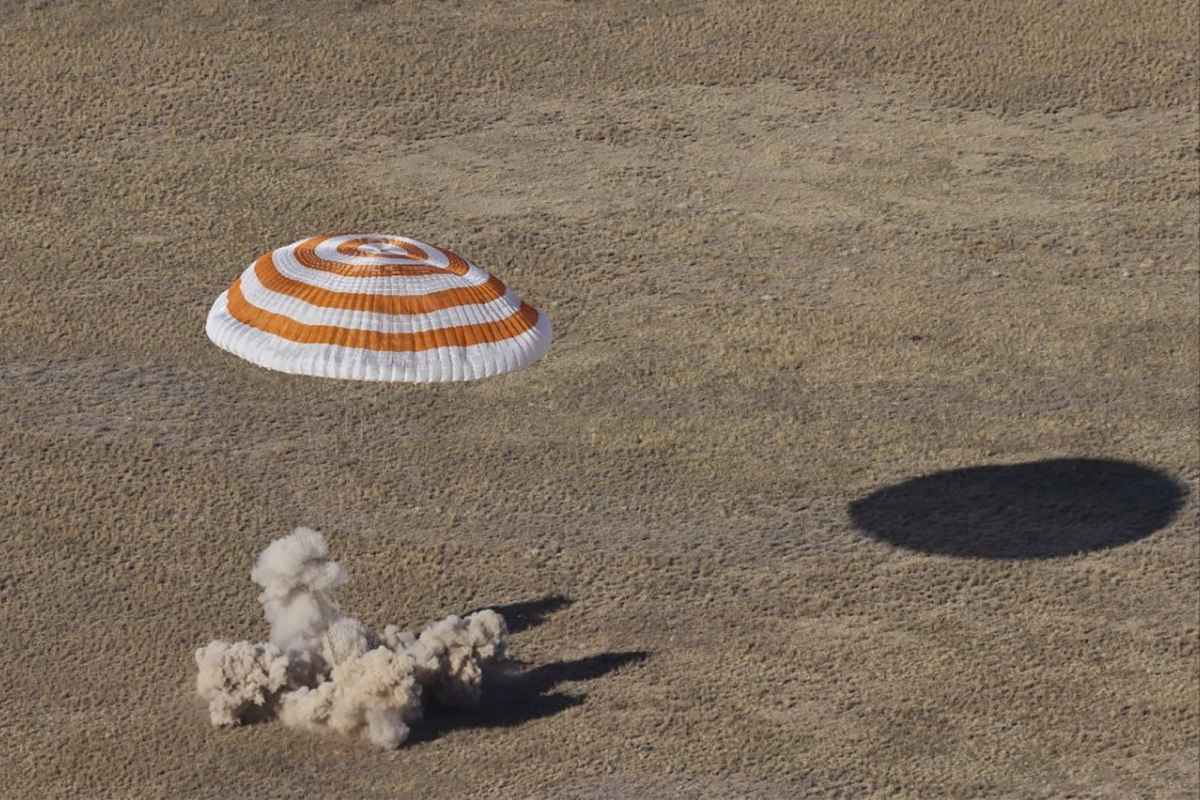 The Russian Soyuz MS-21 space capsule lands southeast of the Kazakh town of Zhezkazgan, Kazakhstan, on Sept. 29, 2022. (Pavel Kassin, Roscosmos State Space Corporation via AP)