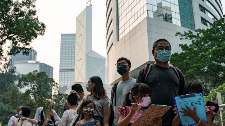 Man Arrested in Hong Kong After Paying Tribute to Queen