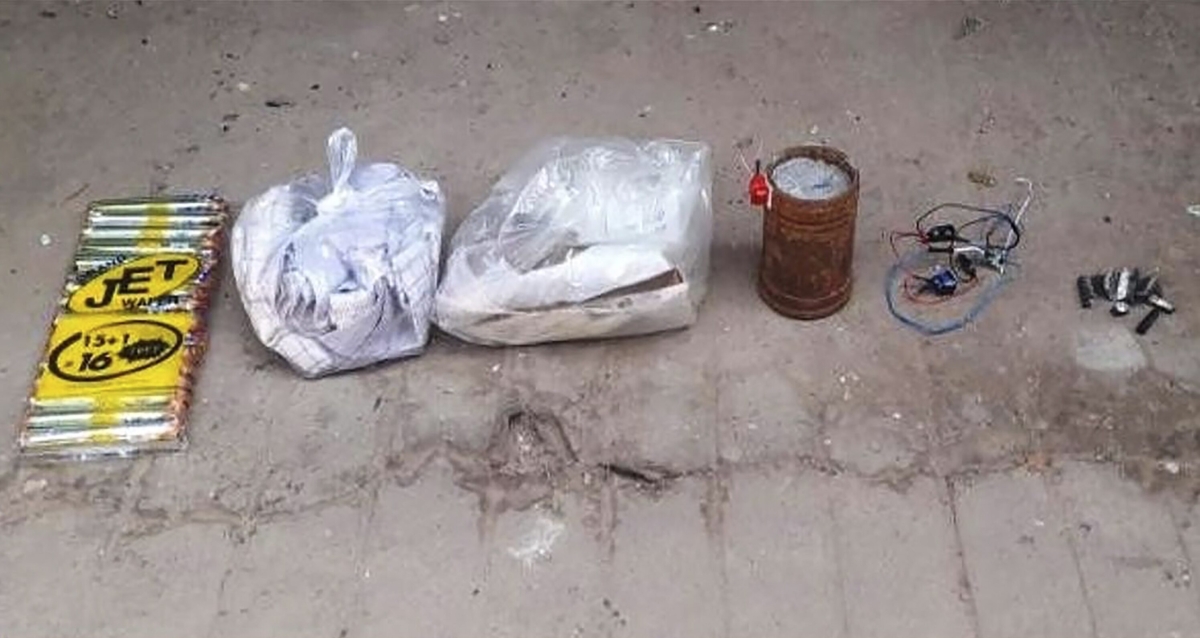 Parcel items to prisoners together with an unexploded bomb are displayed in Yangon, Burma, on Oct. 19, 2022. (Military True News Information Team via AP)