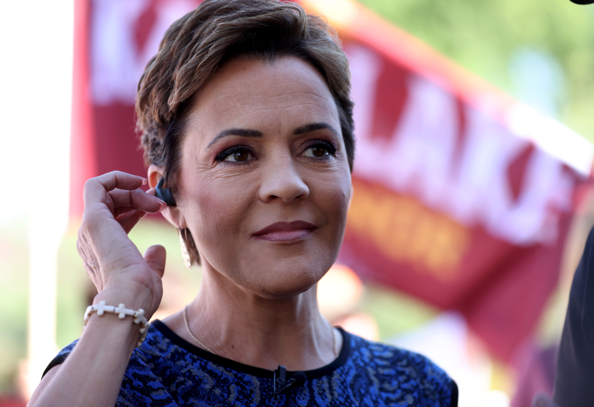 Republican candidate for Arizona Governor Kari Lake speaks to members of the media outside of a polling place before voting in the Arizona primary in Paradise Valley, Arizona on Aug. 2, 2022. (Justin Sullivan/Getty Images)