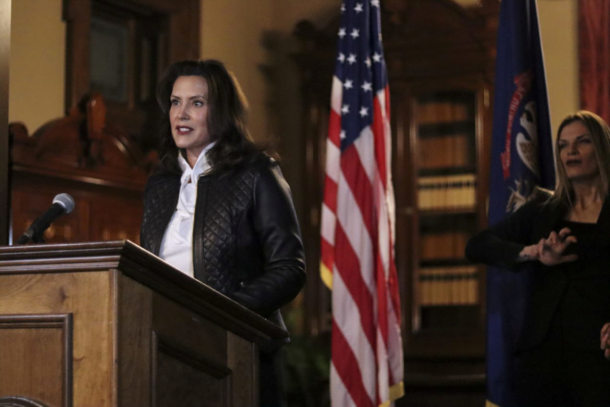 Michigan Gov. Gretchen Whitmer speaks during a news conference after thirteen people, including seven men associated with the Wolverine Watchmen militia group, were arrested for alleged plots to take Whitmer hostage and attack the state capitol building, in Lansing, Mich., on Oct. 8, 2020. (Michigan Governor's office/Handout via Reuters)