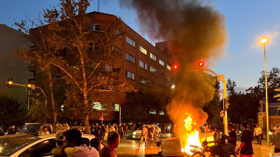Protests Grip Iran as Rights Group Says 19 Children Killed