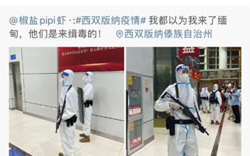 Chinese Police With Weapons Reportedly Lock Down Tourists in Airport
