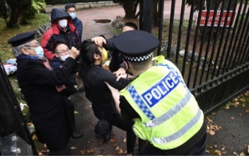 Hong Kong Protester Beaten at Chinese Consulate in UK