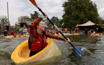 Paddle Your Own Pumpkin: Racers Descend on Belgian Pond