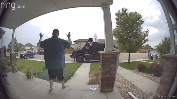 Anderson Lee Aldrich surrenders to police at a home where his mother, Laura Voepel, was renting a room in Colorado Springs, Colo., on June 18, 2021. (Leslie Bowman via AP)