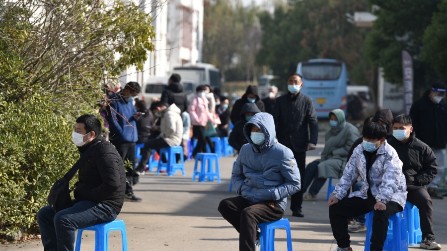 Experts: China a 'Wild Card' For Ending Pandemic