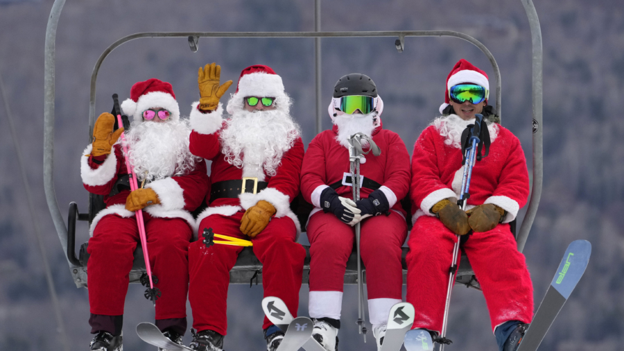 It’s All Downhill for 300 Skiing Santas, a Grinch, and a Tree