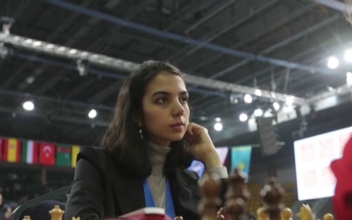 Iranian Female Chess Player Competes Without Hijab