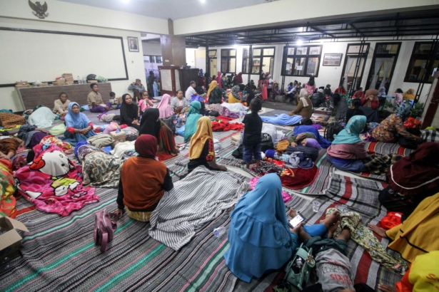 Villagers rest in shelter in Indonesia