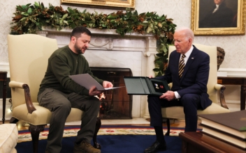 Zelenskyy Gives Biden Military Medal at White House Meeting