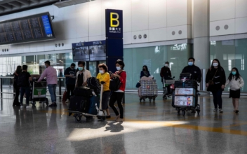 Amid Surge in COVID-19 Cases, China Lifts Quarantine Rules for International Travel