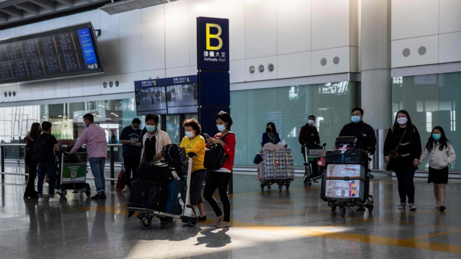 Amid Surge in COVID-19 Cases, China Lifts Quarantine Rules for International Travel