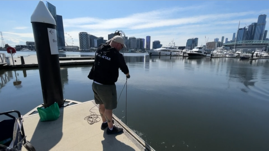 Australian Volunteers Fish out Trash With Magnet