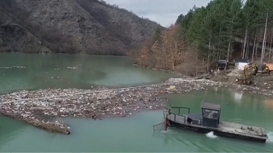 Workers Clean Pile of Trash in Serbian Lake