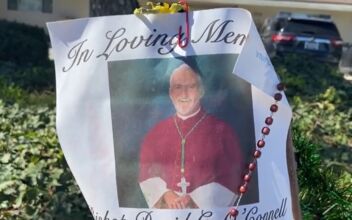 Locals Leave Flowers at Bishop’s Home